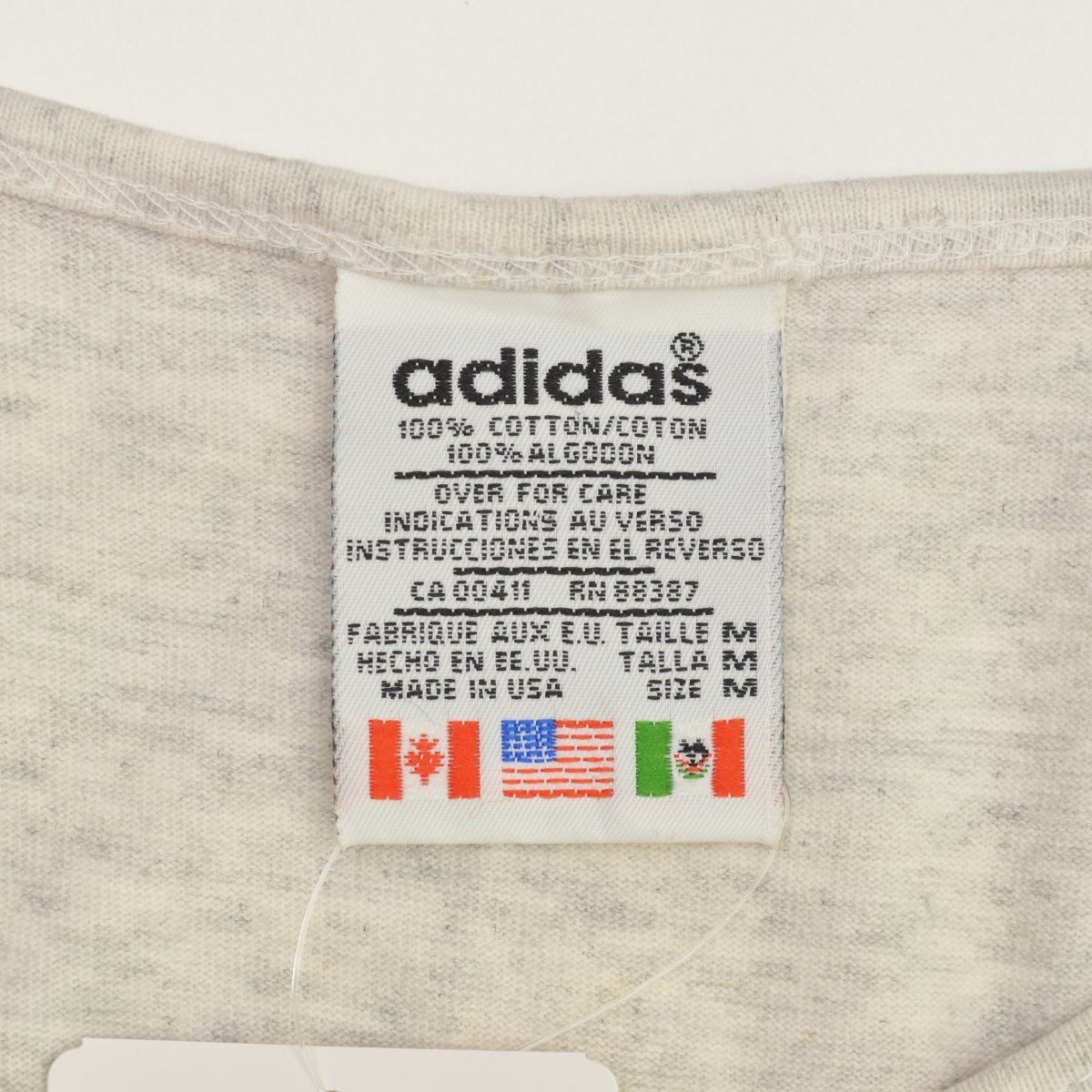 ブランド古着】ADIDAS / アディダス 90s 国旗タグ USA製 トレフォイルプリント タンクトップ | タンクトップ  ブランド古着の買取販売カンフル